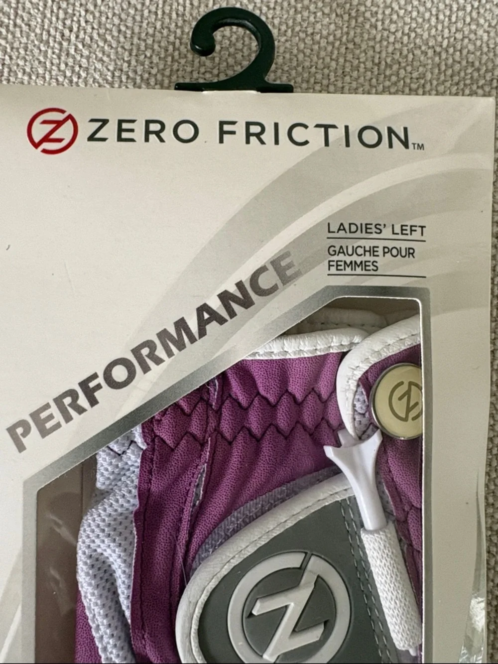 Zero Friction Ladies' Compression-Fit Golf Glove in Purple and White - Picture 3 of 12